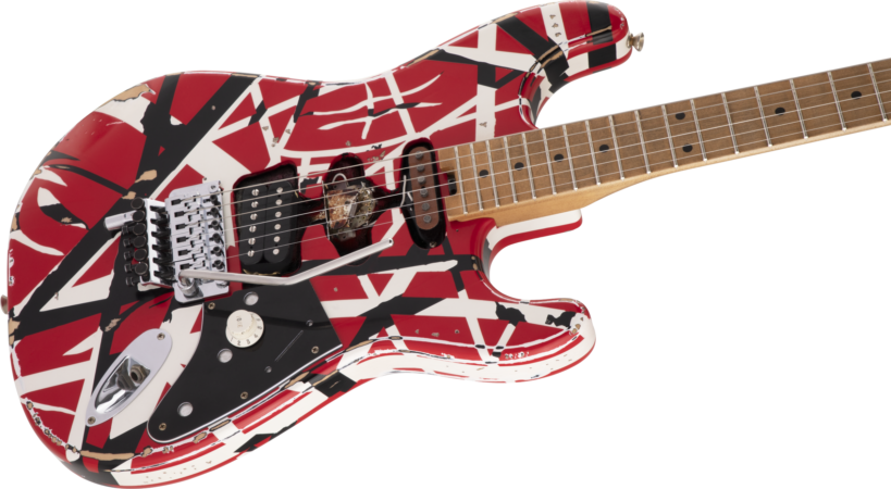 a guitar with a red and white design