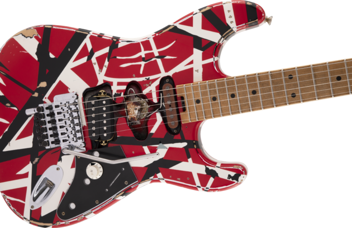 a red and white guitar