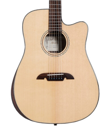 a brown acoustic guitar