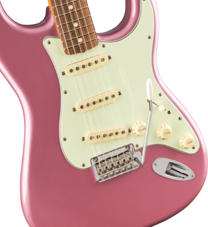 a pink electric guitar