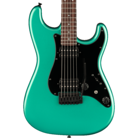 a green electric guitar