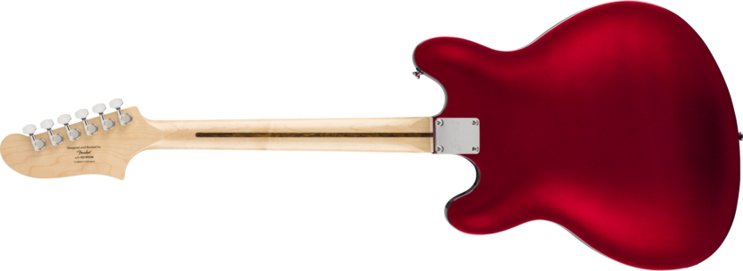 a wooden guitar with a red background