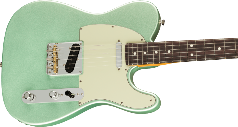 a green electric guitar