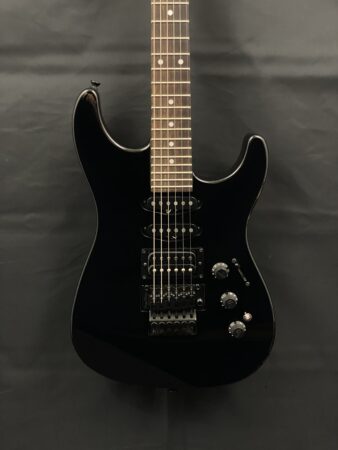 a black electric guitar