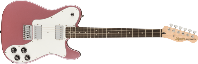 a pink electric guitar