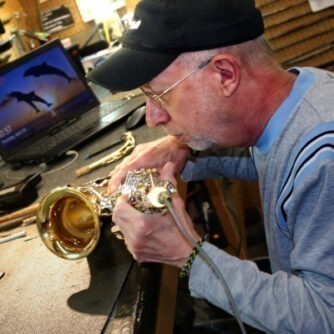 a man playing a trumpet